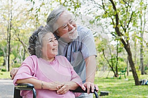 Happy elderly couple with lifestyle after retiree concept. Lovely asian seniors couple embracing together in the park.