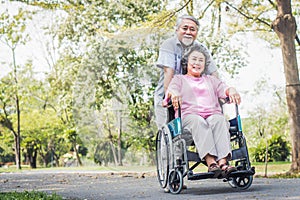 Happy elderly couple with lifestyle after retiree concept. Lovely asian seniors couple embracing together in the park.