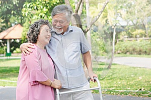 Happy elderly couple with lifestyle after retiree concept. Lovely asian seniors couple embracing together in the park.