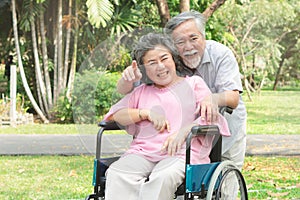 Happy elderly couple with lifestyle after retiree concept. Lovely asian seniors couple embracing together in the park.