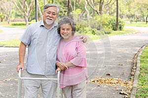 Happy elderly couple with lifestyle after retiree concept. Lovely asian seniors couple walking exercise in the park in the morning