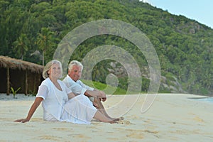 Happy elderly couple resting