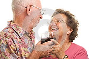 Happy Elderly Couple Toasting photo