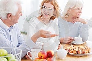 Happy elderly friends enjoying retirement