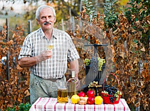 Happy elderly man with crops