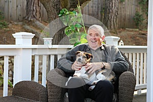 Happy Elderly Man with Dog