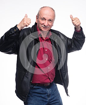 Happy elderly man showing ok sign