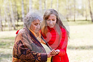 Happy elderly woman with her daughter