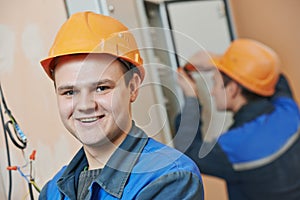 Happy electrician engineer worker