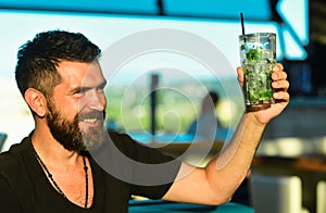 Happy elegant man drinking beer. Beer pubs and bars. Man holding mug of beer.