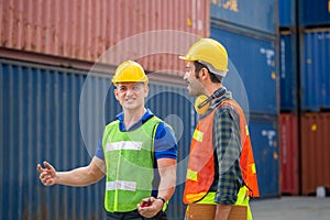 Happy engineer and foreman at industry containers cargo, Worker team at the construction site, Teamwork concepts