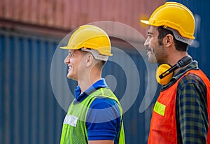 Happy engineer and foreman at industry containers cargo, Worker team at the construction site, Teamwork concepts