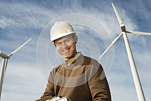 Happy Engineer At Wind Farm