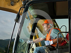 Happy excavator driver