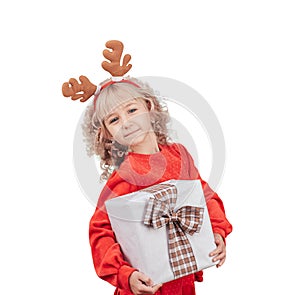 Happy excited girl child holding christmas gift box