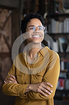 Happy excited young Black business woman professional head shot portrait