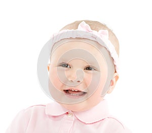 Happy face of baby girl with bowknot on head photo