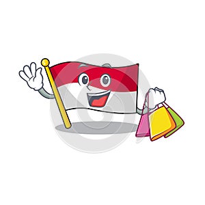 Happy face flag monaco Scroll mascot style waving and holding Shopping bag