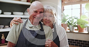 Happy, face and old couple in kitchen hug with love, support and care in marriage or retirement. Elderly, man and woman