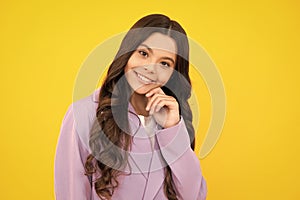 Happy face, positive and smiling emotions of teenager girl. Headshot portrait of teenager child girl isolated on studio