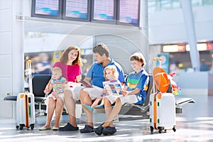 Happy family at the airport photo