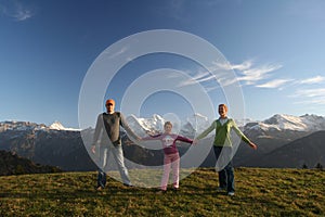 Happy family in Alps