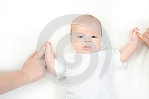 Happy family - baby on the bed