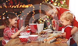 Happy family bake christmas cookies