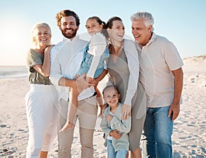 Happy family at the beach. Family relaxing on the beach during a holiday. Parents and grandparents bonding with children