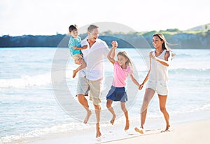 Happy Family on the Beach photo