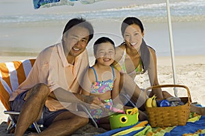Happy Family On Beach Vacation