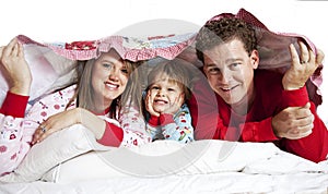 Happy Family in bed