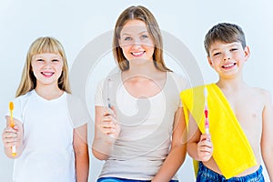 Family brushing teeth