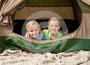 Happy family camping in the park