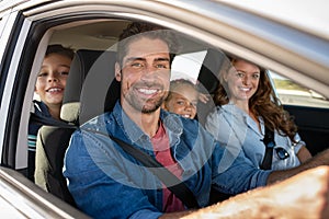 Happy family in car