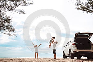 Happy Family with car travel road trip. summer vacation in car in the sunset, Dad, mom and daughter happy traveling enjoy together