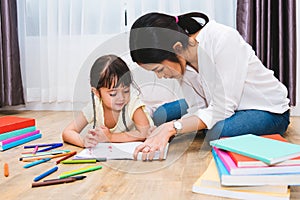 Happy family child kid girl kindergarten drawing teacher education mother mom with beautiful mother