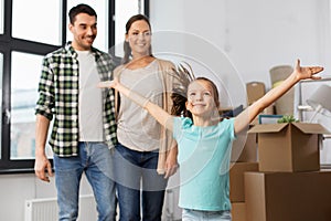 Happy family with child moving to new home