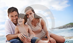 Happy family, child and portrait at beach for travel holiday in summer with a smile and fun. A man, woman and kid or son