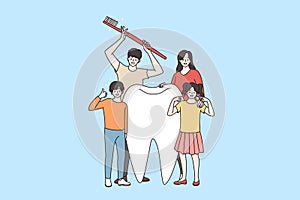 Happy family with children encourage tooth hygiene