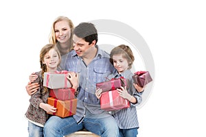 Happy family and children shopping gifts.