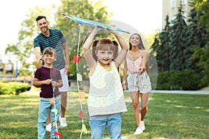 Happy family with children spending time together