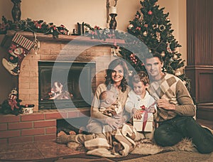 Happy family in Christmas decorated house