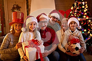 Happy family with Christmas gifts