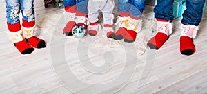 Happy family with Christmas socks. Winter holiday concept