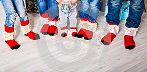 Happy family with Christmas socks. Winter holiday concept