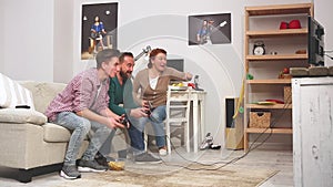 Happy Family Concept. Son with dad gamers, play video console game.