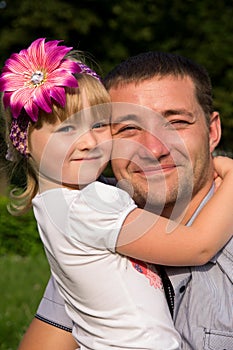 Happy family, dad daughter hugs