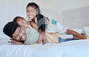 Happy family, dad and girl kids on bed in home with smile, portrait father and children play together in Asia. Love, fun