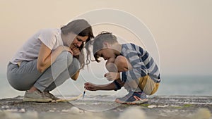 Happy family dad with son play together. Father and child spend time together in nature